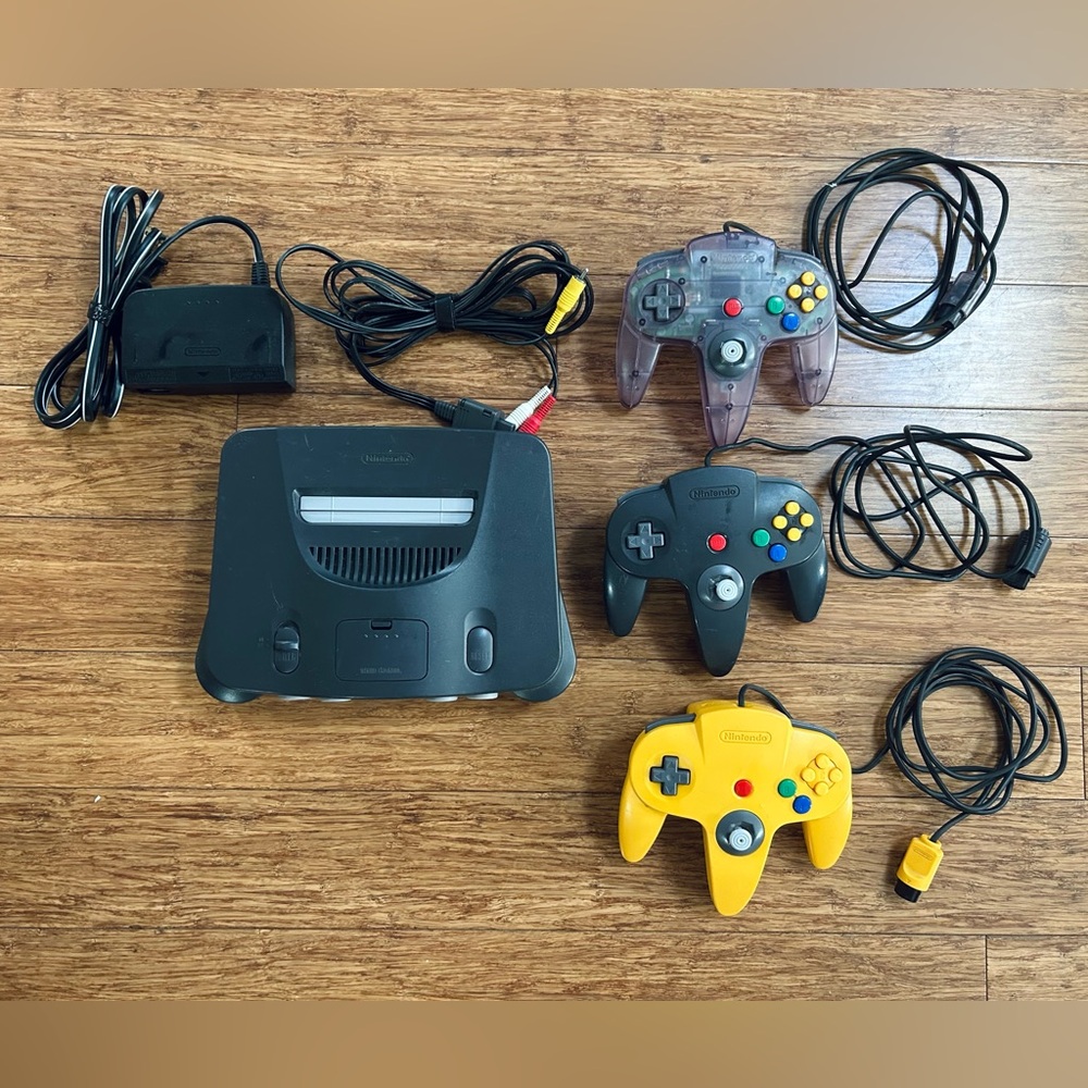 Nintendo 64 N64 Game Console w/ Atomic Purple, Black & Yellow controllers